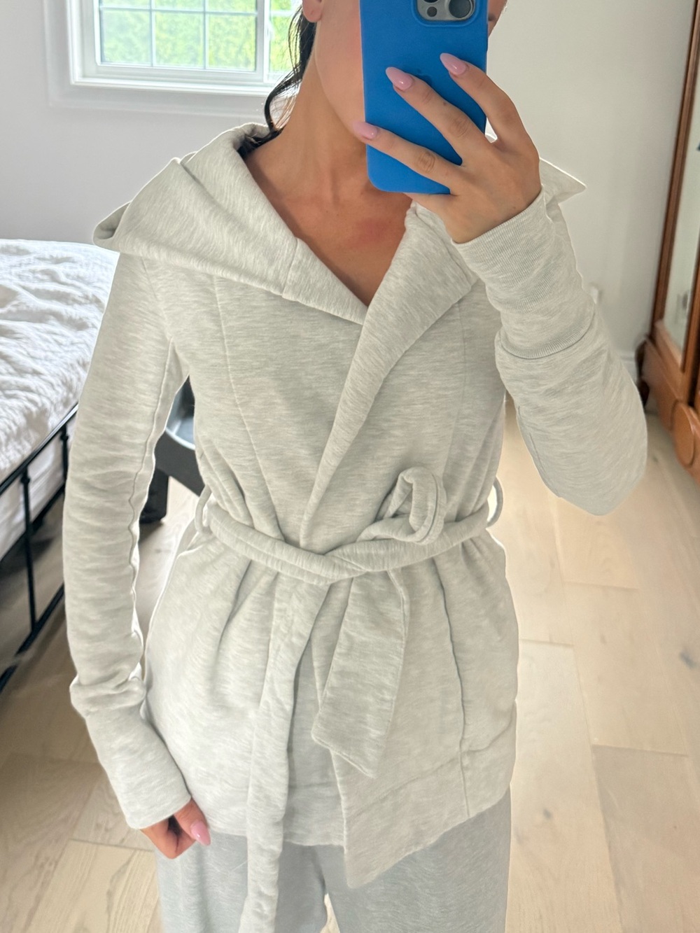 Community sweater with tie